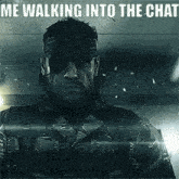 a man with a beard and sunglasses is walking into a chat .
