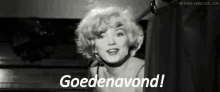 a black and white photo of a woman saying goedeavond