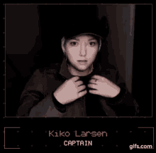 a woman is wearing a hat and a jacket in a video game .
