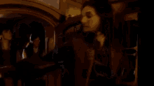 a blurry picture of a woman in a room