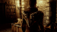 a person standing in a dark room with a bookshelf behind them