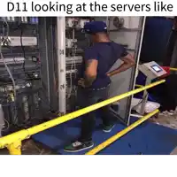 a man standing in front of a server with the caption d11 looking at the servers like on the bottom