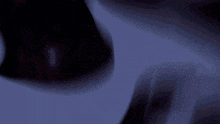 a close up of a anime girl 's face with pink eyes .