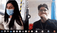 a man and a woman wearing masks are having a video call .