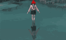 a woman in a red hat is standing in the water with her reflection