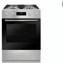 a stainless steel stove with a black door and a digital display