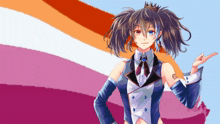 a girl with a crown on her head is standing in front of a rainbow flag
