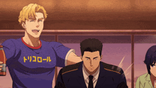 a man in a blue shirt that says " トリコロール " on it
