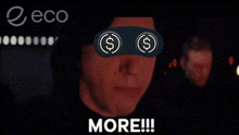a man wearing a blindfold with a dollar sign on his eyes screams more