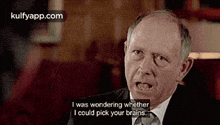 a man in a suit and tie is talking and saying `` i was wondering whether i could pick your brains ''