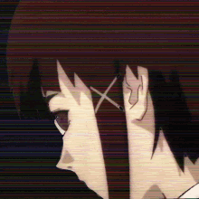 a close up of a person 's face with an x on their forehead