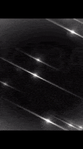 a blurred image of a star with the word kastar in the corner