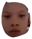 a close up of a child 's face with a circle around it .