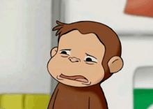 a close up of a cartoon monkey with a sad look on his face