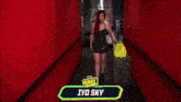 a woman in a black dress is holding a yellow bag with the name iyo sky on the bottom