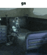 a picture of a bedroom with the word gn in the corner