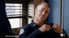 grin kelly severide chicago fire smile pleased