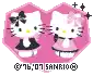 two hello kitty cats are standing next to each other on a pink heart shaped background .
