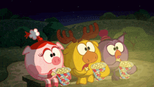 three cartoon characters are sitting on a bench eating popcorn and one of them has antlers on his head