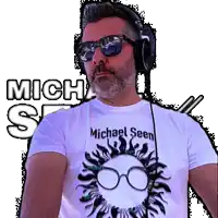 a man wearing headphones and sunglasses is wearing a shirt that says michael seen