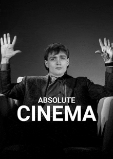 a poster for absolute cinema shows a man sitting in a chair with his hands in the air