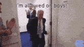 a man in a suit and tie standing in a doorway with the words i 'm allowed on boys below him