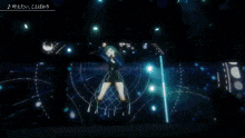 a girl in a black dress is dancing on a stage in front of a screen with chinese writing on it