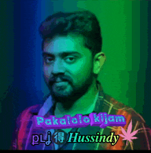 a man with a beard has the name hussindy on the bottom of his picture