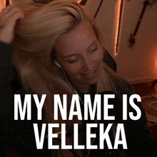 a woman with headphones and the words my name is velleka