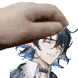 a hand is putting a sticker on a person 's face .