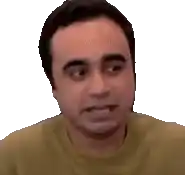 a close up of a man 's face with a yellow shirt on .