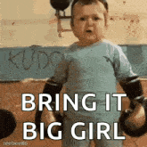 a baby is wearing boxing gloves and saying " bring it big girl "
