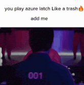 a man wearing a shirt with the number 001 on it