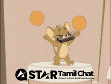 an advertisement for star tamil chat shows jerry holding two balls in his hands