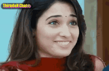 a close up of a woman 's face with the words thirudak chat on the bottom right
