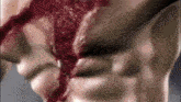 a close up of a person 's chest with blood coming out of it