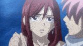 a girl with red hair and a boy with pink hair are looking at each other