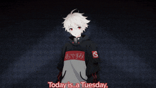 a boy wearing a hoodie that says ' today is a tuesday ' on it