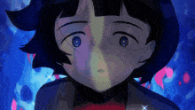 a close up of a girl 's face with a blue background