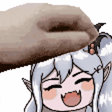 a person is putting a donut on top of a cartoon girl 's head .