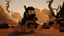 a lego character is standing in the desert with a sword