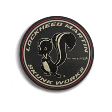 a lockheed martin skunk works sticker with a skunk on it