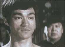Bruce Lee Laugh GIF - Bruce Lee Laugh GIFs