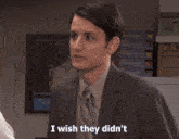 a man in a suit says " you know keep-i look away "