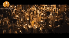 a group of people holding lanterns in front of a microphone that says whatsapp status on the bottom