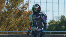 a man in a superhero costume is standing on a ledge