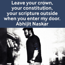a man stands in front of a sign that says " leave your crown "