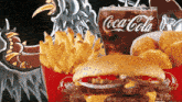 a coca cola and a wendy 's hamburger and french fries