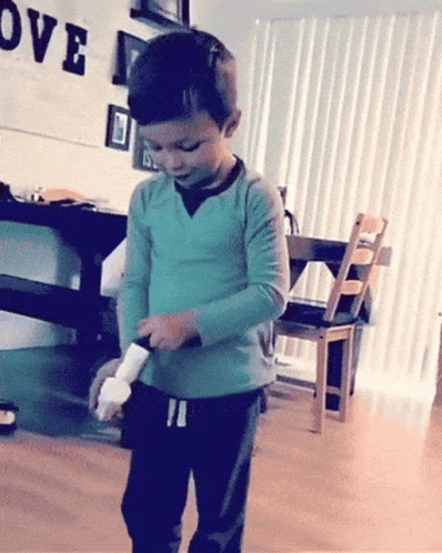 Stupid kid shooting himself in the dick with a toy gun.