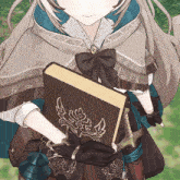 a girl in a cape is holding a book with a dragon on it